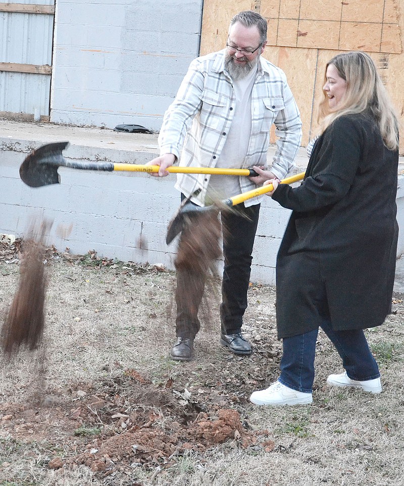 TIMES photograph by Annette Beard
Pastor David Austin and his wife, Julie, turned the first shovels of dirt Wednesday, Nov. 30, for the groundbreaking ceremony for the new sanctuary at The Ridge Church, Pea Ridge.