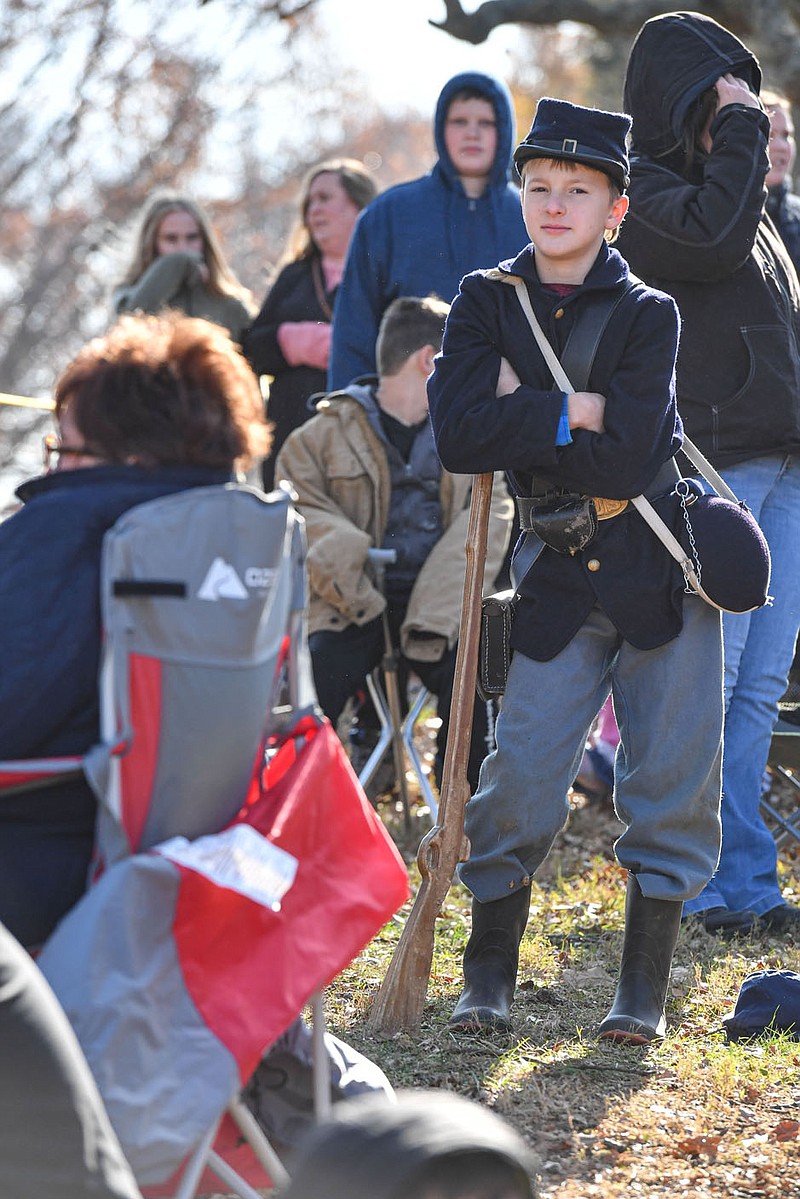 HANK LAYTON NWA DEMOCRAT-GAZETTE
Matthew Rowe, 9, of Fayetteville, awaits the start of the Battle of Prairie Grove reenactment in Prairie Grove. The event was held Saturday and Sunday at Prairie Grove Battlefield State Park.