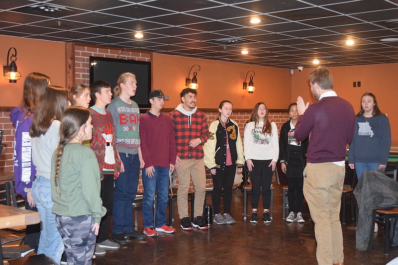 Rochelle Eiselt/Fulton Sun

Fulton High School Chamber singers perform Christmas songs for Fulton Rotary Club Wednesday.