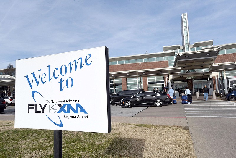 Passengers arrive and depart Dec. 24 2019, at Northwest Arkansas National Airport. 
(File Photo/NWA Democrat-Gazette/Flip Putthoff)