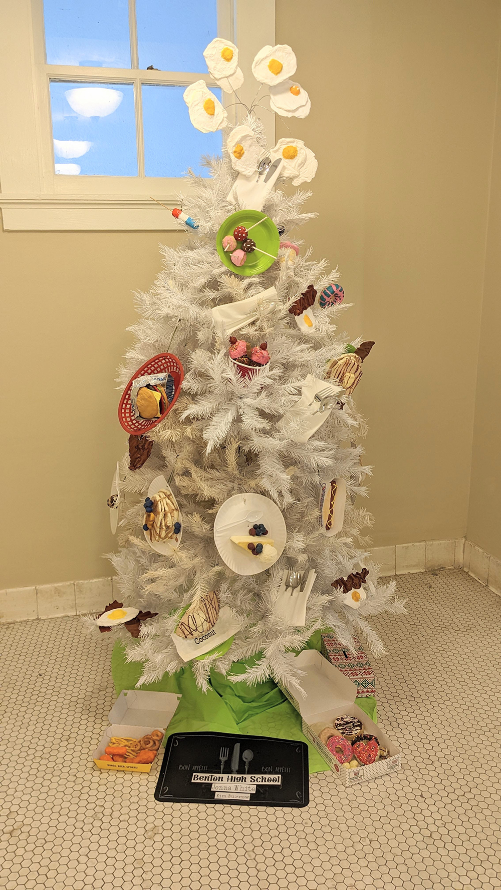 Local students decorate trees for bath house