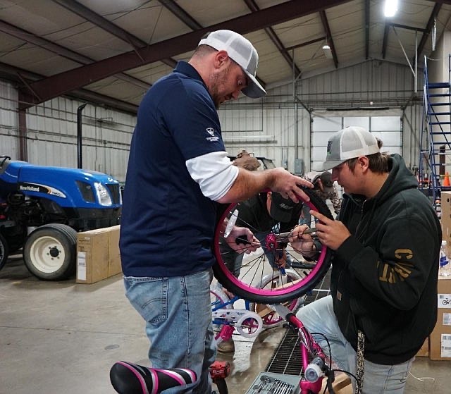 State Technical College of Missouri faculty, staff and students assemble bicycles to donate to children in Osage County during the holidays. (Courtesy/Brandon McElwain)