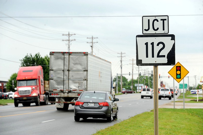 Traffic flows Friday, May 29, 2015, along Henri de Tonti Boulevard in Tontitown near the intersection with Arkansas 112. (NWA Democrat-Gazette/ANDY SHUPE)