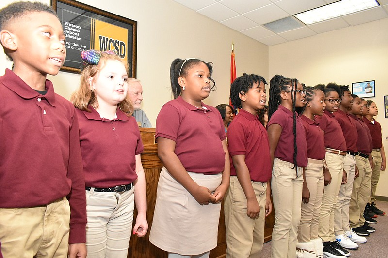The Coleman Elementary Choir performs the school song at the Watson Chapel School District board meeting Monday. (Pine Bluff Commercial/I.C. Murrell)
