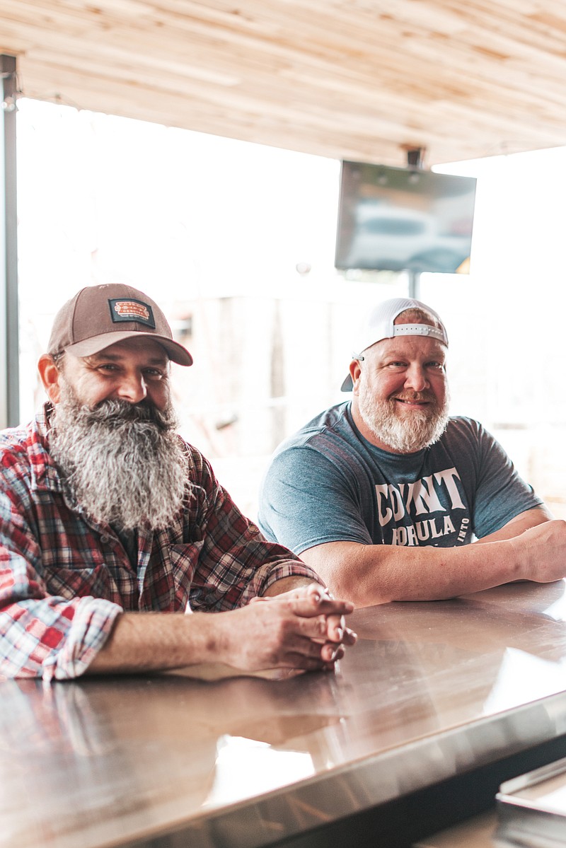 Walt Todd (left) and Kelly Lovell are co-owners of Count Porkula.(Special to the Democrat-Gazette)