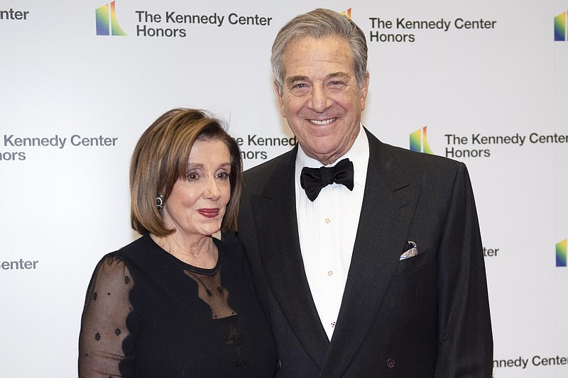 Speaker of the House Nancy Pelosi, D-Calif., and her husband, Paul Pelosi, arrive at the State Department for the Kennedy Center Honors State Department Dinner, on Dec. 7, 2019, in Washington. The state court case continues against the man accused of breaking into House Speaker Nancy Pelosi's home, beating her husband and seeking to kidnap her. Suspect David DePape's preliminary hearing is scheduled for Wednesday, Dec. 14, 2022. (AP Photo/Kevin Wolf, File)