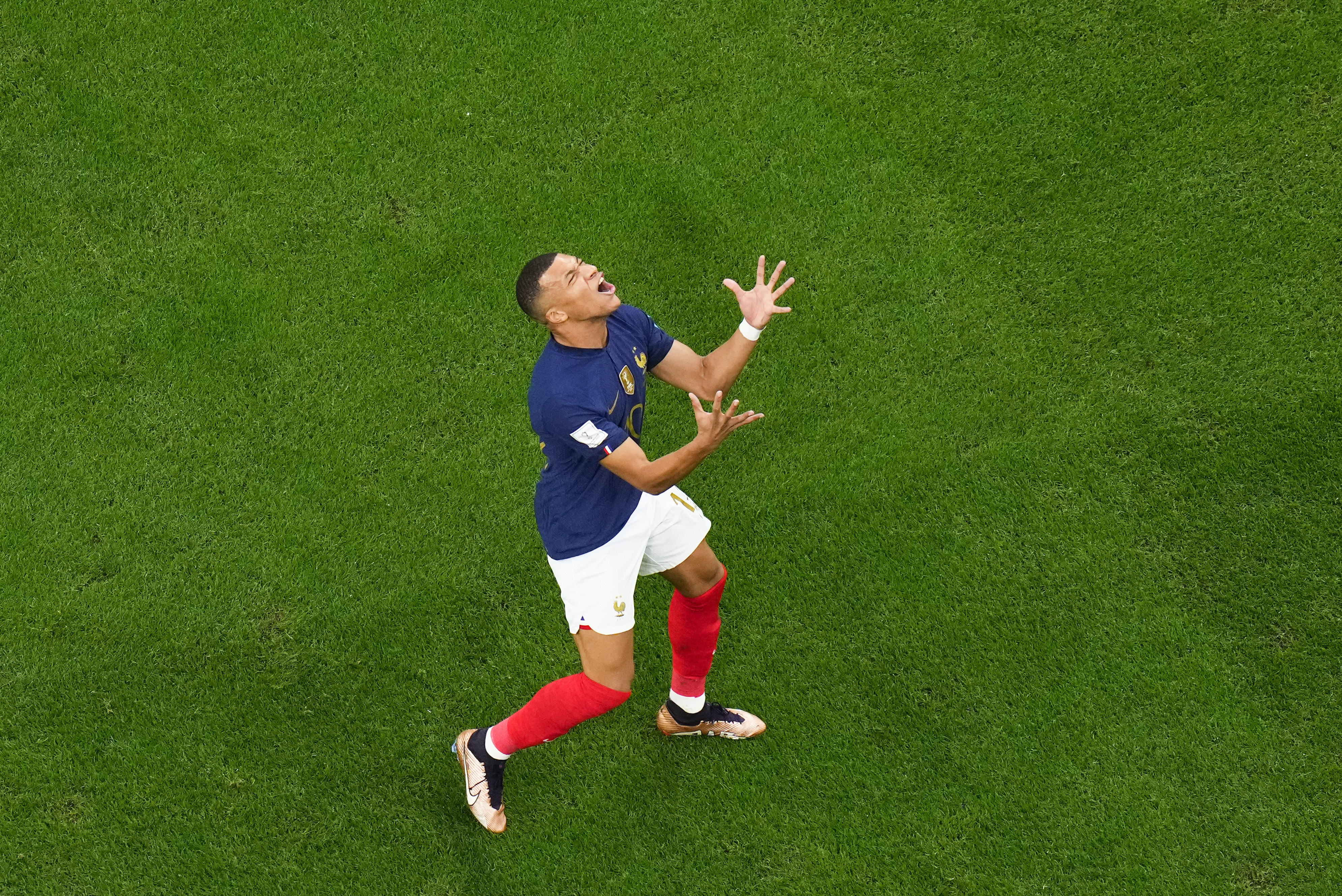 Kylian Mbappe of France with the shirt of Achraf Hakimi of Morocco at full  time during the FIFA World Cup 2022, Semi-final football match between  France and Morocco on December 14, 2022