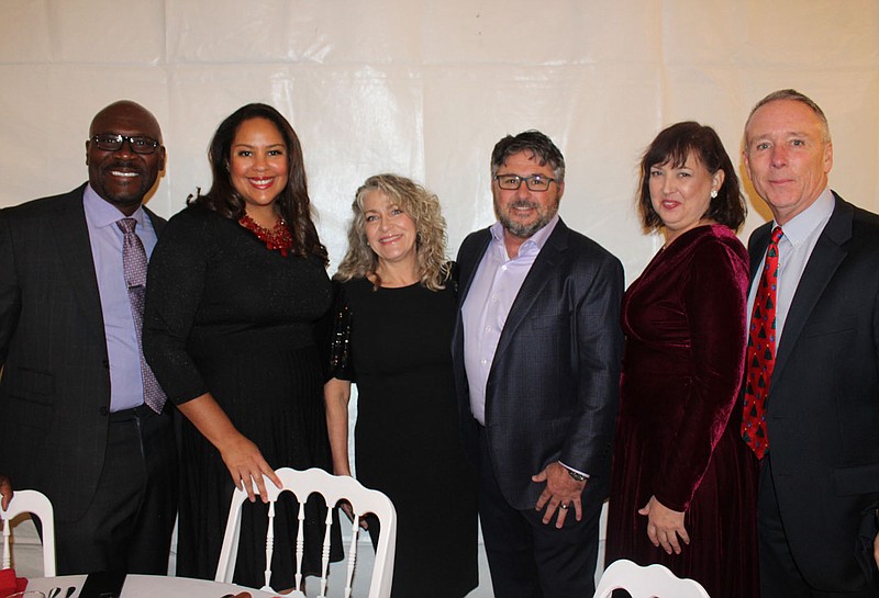 Joseph and Angelique Obiri (from left), Sheila and Jon Morgan and Melissa and Gregg Holdtke attend Christmas at Peel Museum on Dec. 2 to support of Peel Compton Foundation.
(NWA Democrat-Gazette/Carin Schoppmeyer)