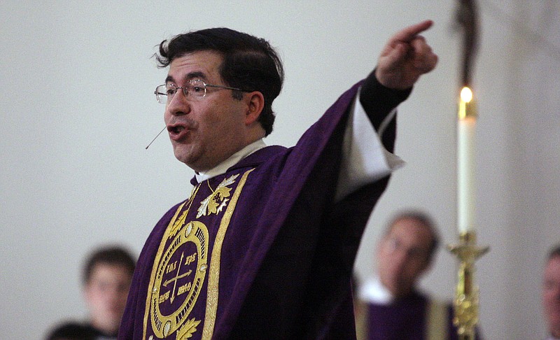 Frank Pavone, head of Priests for Life, gives the homily during a mass at Ave Maria University's Oratory on March 31, 2009, in Naples, Fla., to recognize the fourth anniversary of Terri Schiavo's death. The Vatican has defrocked Pavone for what it said were “blasphemous communications on social media” as well as “persistent disobedience” of his bishop. A letter to U.S. bishops from the Vatican ambassador to the U.S., Archbishop Christophe Pierre, obtained Sunday, Dec. 18, 2022, said the decision against Pavone had been taken Nov. 9 and that there was no chance for an appeal. (Greg Kahn/Naples Daily News via AP, File)