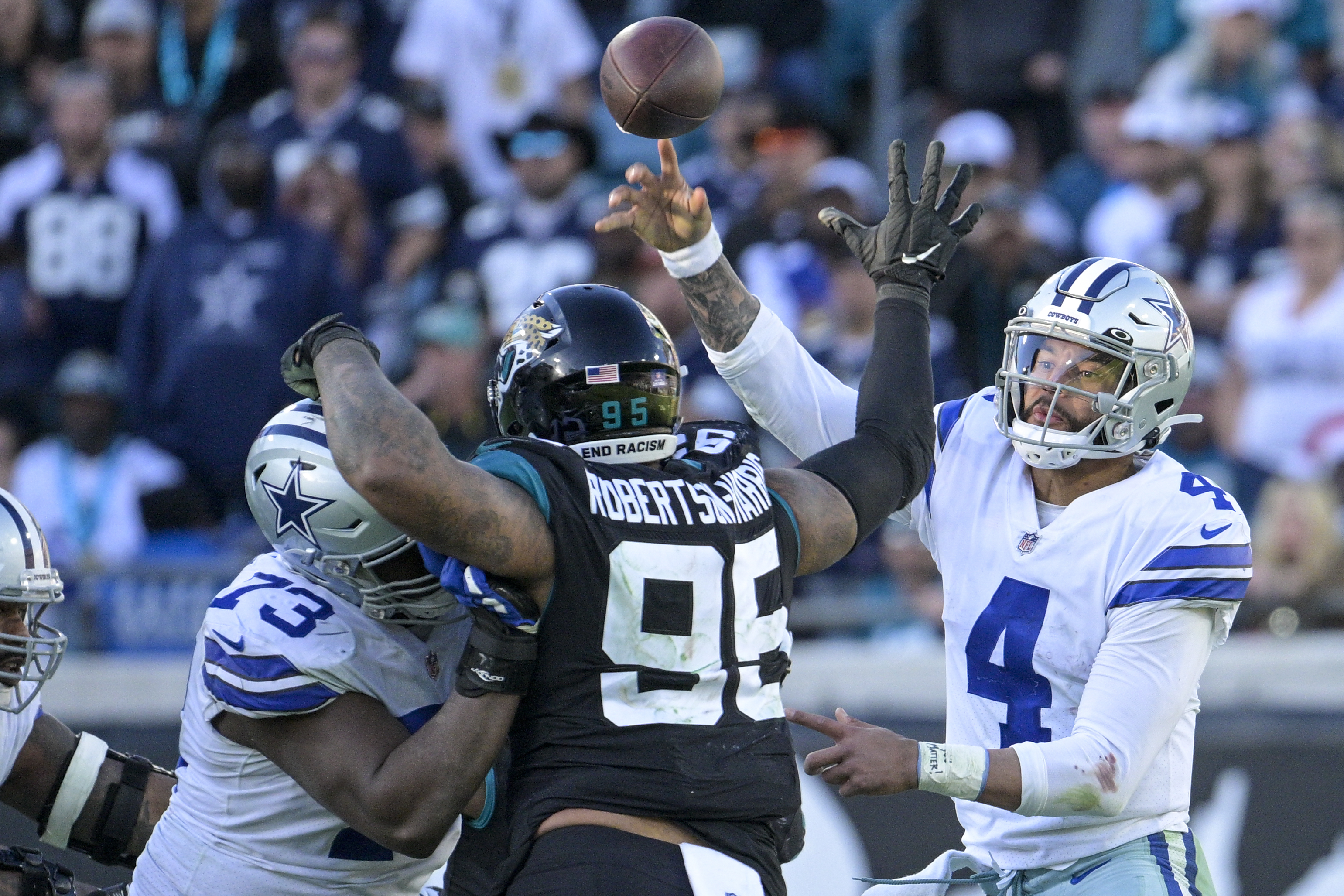 Dallas Cowboys' Dak Prescott celebrates a touchdown during the second half  of an NFL football game against the Indianapolis Colts, Sunday, Dec. 4,  2022, in Arlington, Texas. (AP Photo/Ron Jenkins Stock Photo 