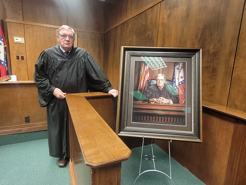 Photo by Bradly Gill
Judge Hamilton Singleton stands next to his portrait that was hung in the Ouachita County Courthouse during a ceremony on Tuesday, December 13, 2022.