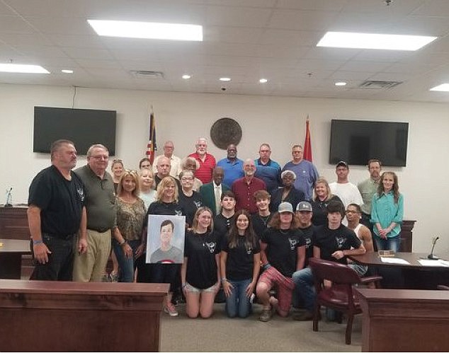 Courtesy photo
 Ouachita County residents and members of the Ouachita County Quorum Court pose after enacting ‘Cooper’s Law’ which will promote water safety in the county.