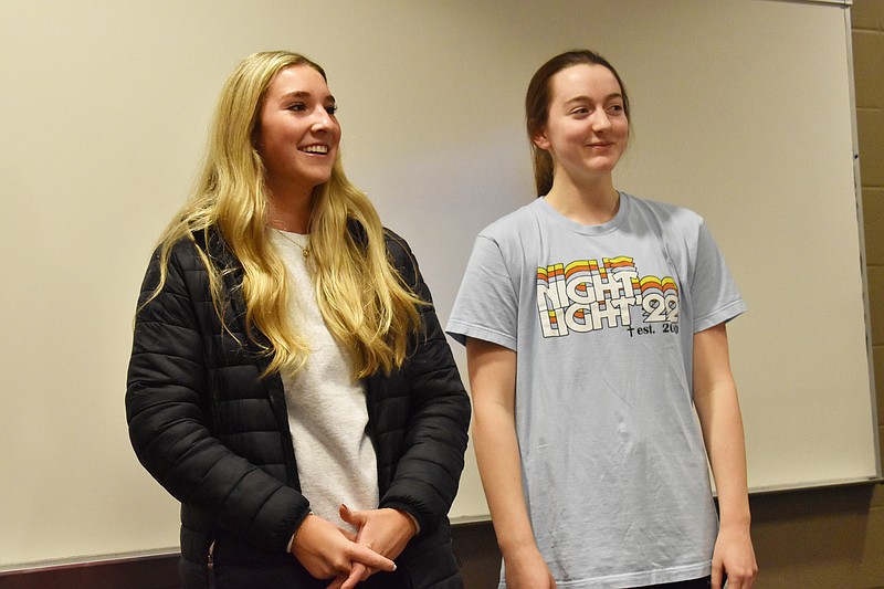 Democrat photo/Garrett Fuller — Isabella Kincaid, left, and Lauren Friedrich smile Dec. 14 California High School as the California R-I Board of Education commends the duo on being named to the All-State volleyball team at its December meeting.