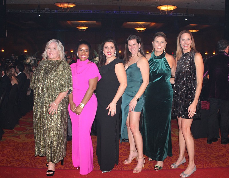 Karen Roberts (from left), Latriece Watkins, Silvia Azrai Kawas, Bethany Stephens, Melody Richard and Laura Phillips gather at the O' Night Divine Charity Ball to support Mercy Health Foundation Northwest Arkansas on Dec. 3 at the Rogers Convention Center. 
(NWA Democrat-Gazette/Carin Schoppmeyer)