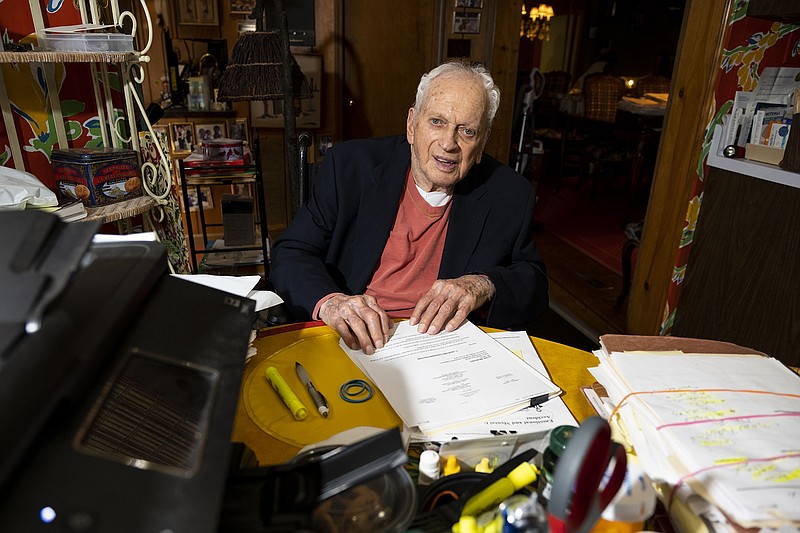 Stanley Sacks sits for a portrait at the kitchen table at his home in Norfolk, Virginia on Nov. 10, 2022. Sacks is 100 years old and the oldest active attorney in Virginia. He works from the kitchen table in his house everyday. “He practiced until the very end too,” Sacks said about his father, who started the Sacks & Sacks firm. (Billy Schuerman/The Virginian-Pilot/TNS)