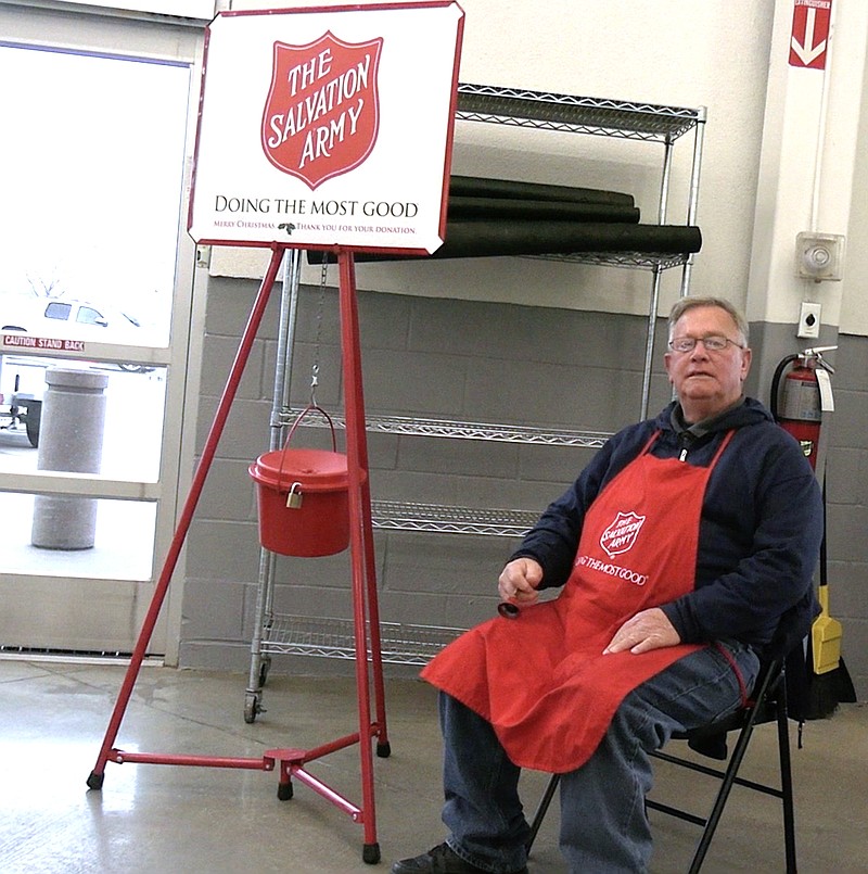 Bill Hirsch rings a bell just inside the entrance to Sam’s Club, 1368 Higdon Ferry Road, Thursday afternoon. - Photo by Lance Porter of The Sentinel-Record