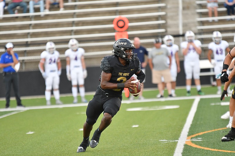 Pleasant Grove quarterback Ahkari Johnson looks to make a play during a game this season. Johnson, who was named the Texarkana Gazette's Offensive Player of the Year for 2022, had more than 2,500 total yards and 33 touchdowns this year. (Photo by Kevin Sutton/TXKSports.com)