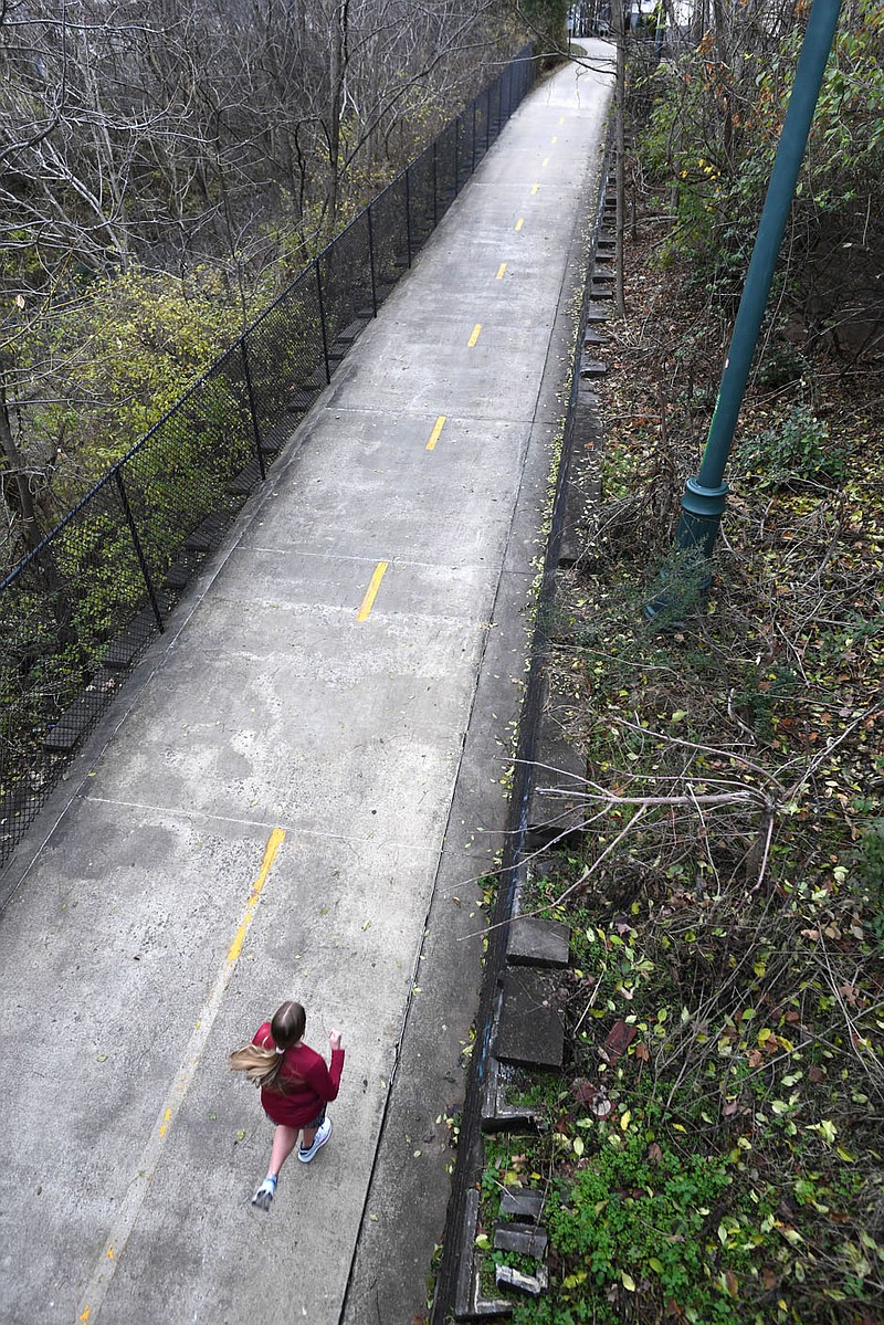 A resident runs Wednesday along the Razorback Greenway in Fayetteville. Visit nwaonline.com/photo for today’s photo gallery.

(NWA Democrat-Gazette/Andy Shupe)