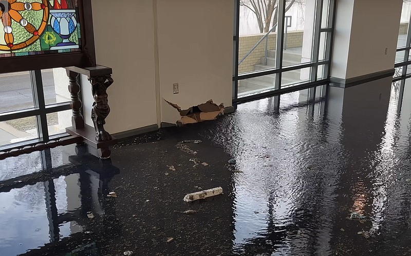 A break in a sprinkler line related to subfreezing temperatures caused minor flooding in the Hot Springs Convention Center on Friday. - Photo by Lance Brownfield of The Sentinel-Record