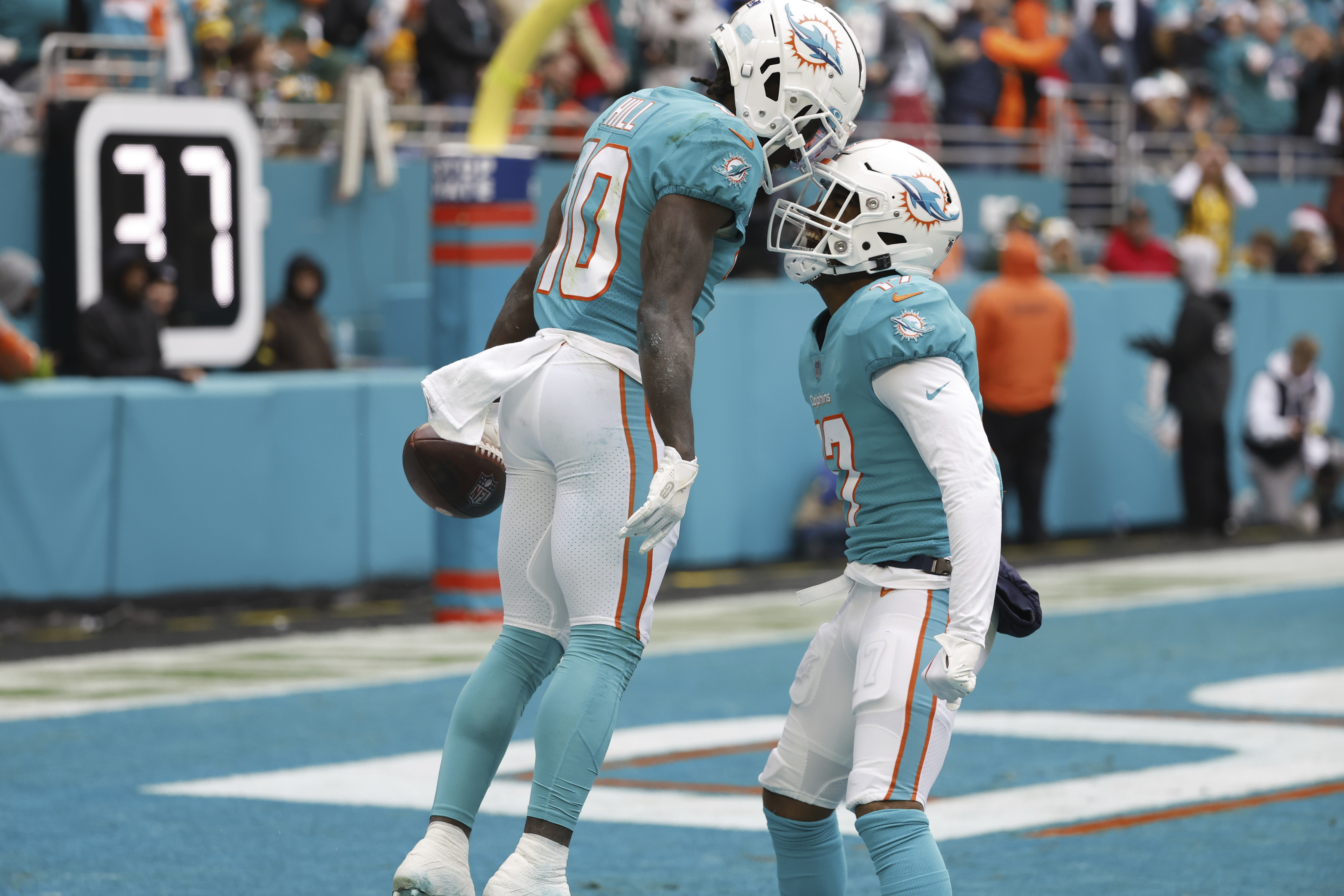 Tyreek Hill Miami Dolphins Unsigned Celebrates a Touchdown Photograph