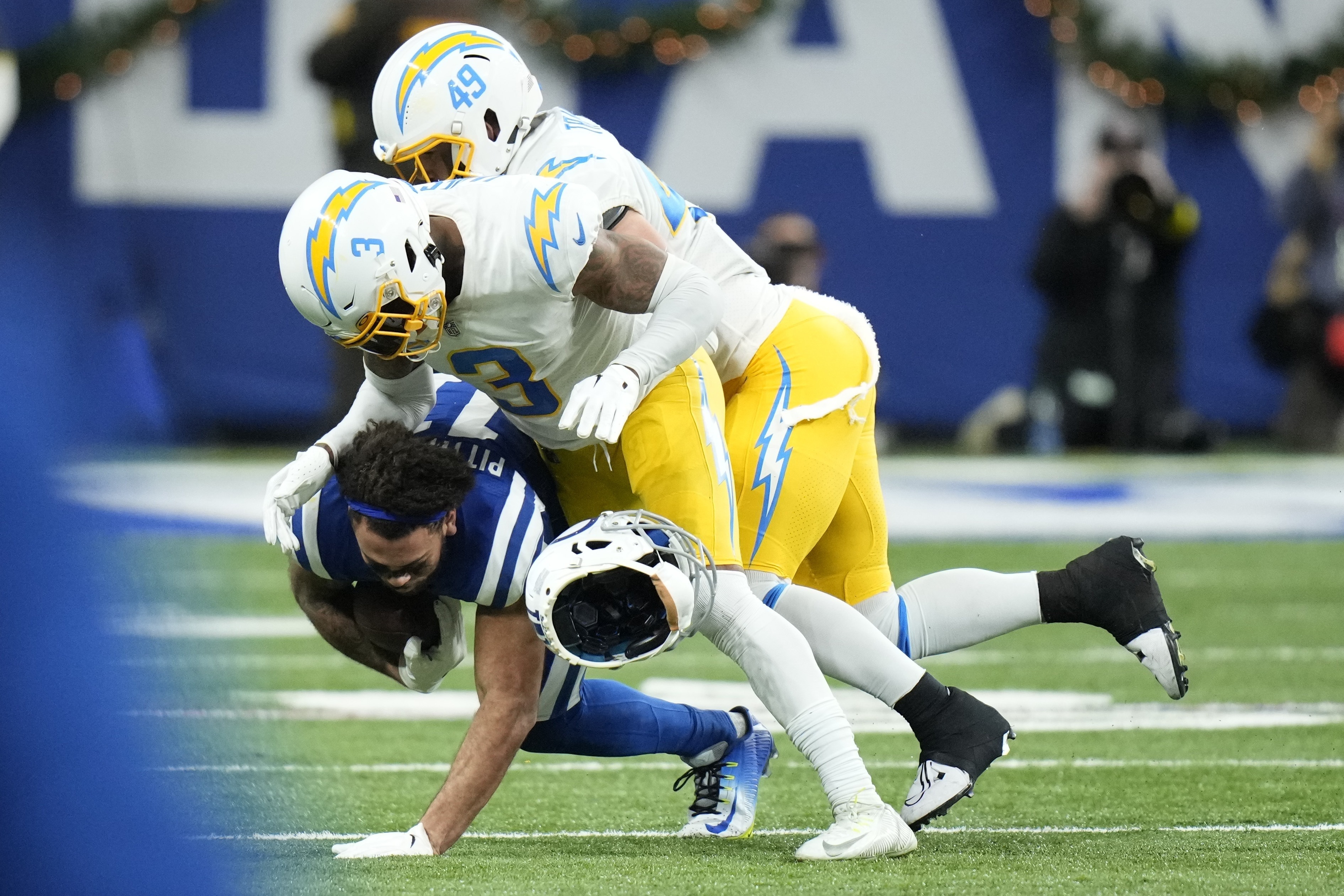 Chargers throttle past Colts in playoff-clinching victory