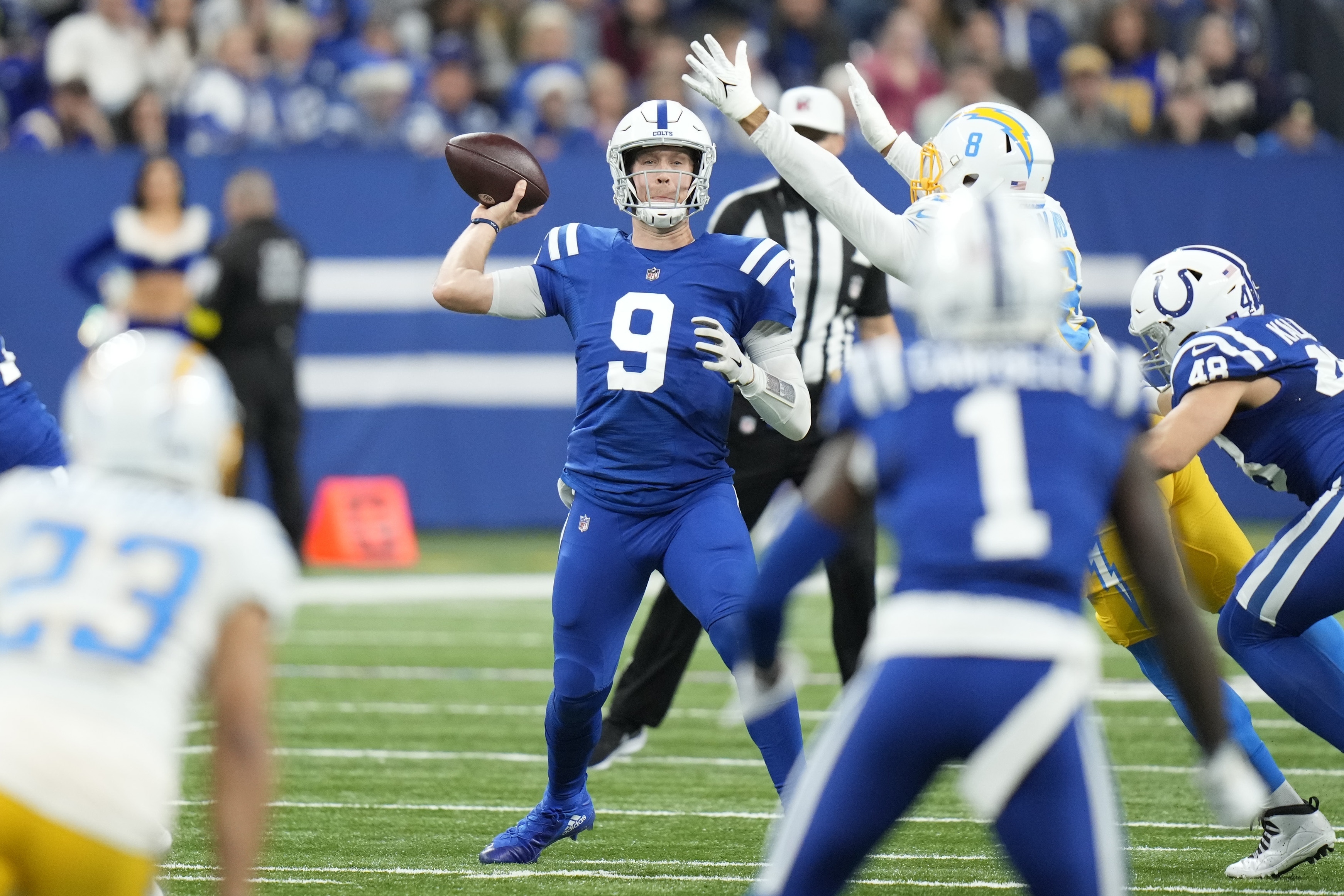 Chargers throttle past Colts in playoff-clinching victory