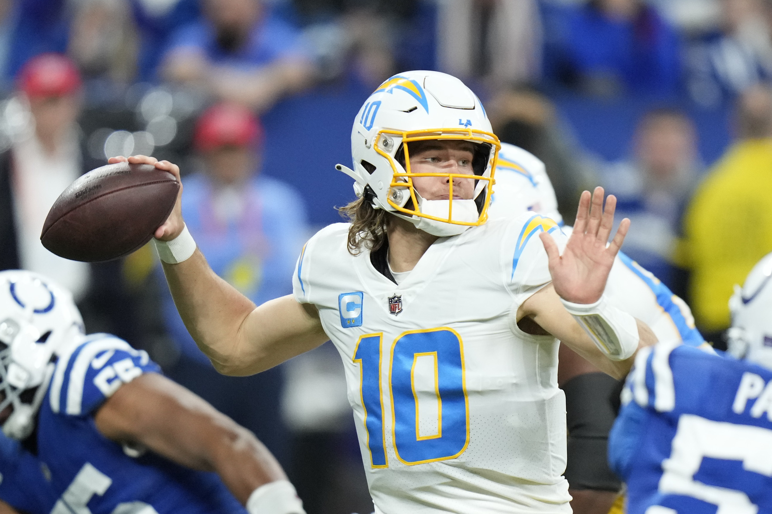 Chargers throttle past Colts in playoff-clinching victory