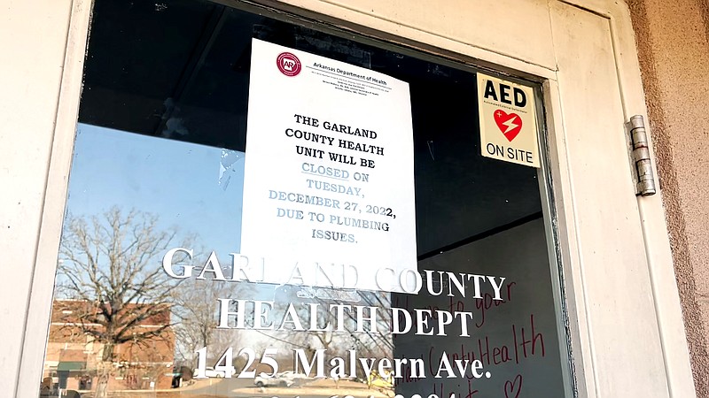 A sign on the door of the Garland County Health Department, 1425 Malvern Ave., tells visitors the facility was closed Tuesday due to burst pipes. The facility is expected to reopen in a limited capacity today, Director Susan Lester said. - Photo by James Leigh of The Sentinel-Record