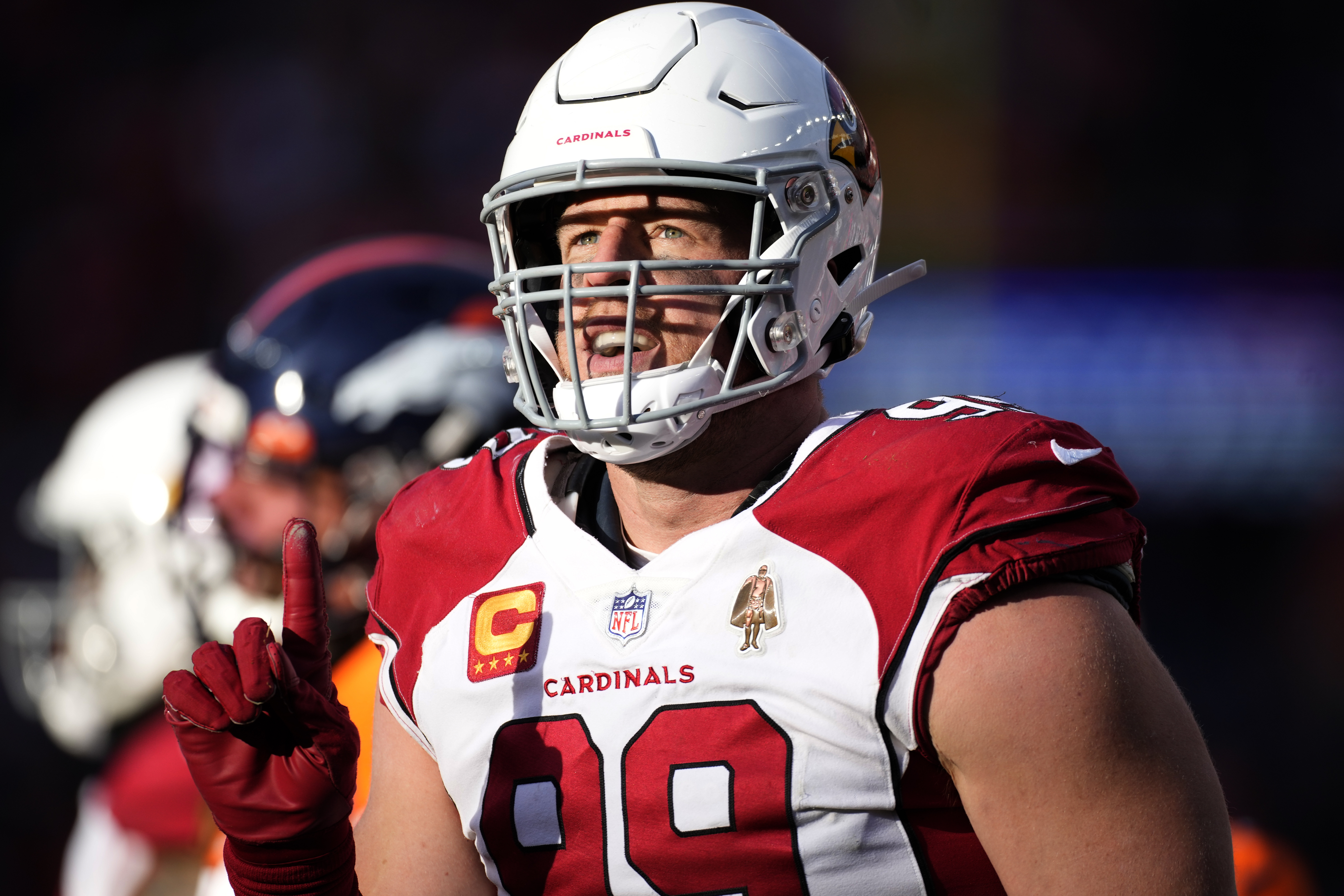 Arizona Cardinals' J.J. Watt points to cleat with son's name after sack