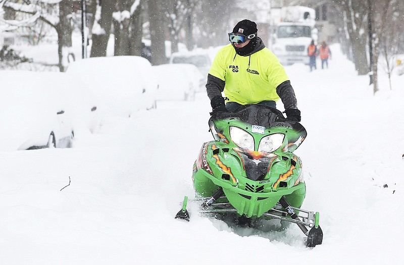 Military police enforce driving ban in snow-stricken Buffalo