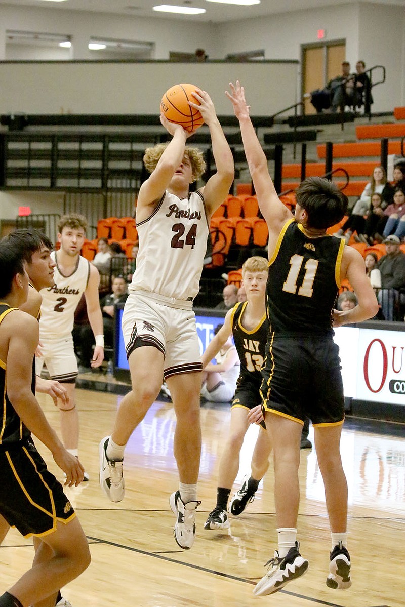 Mark Ross/Special to the Herald-Leader
Siloam Springs sophomore Noah Shipp goes up for a shot against Jay, Okla., during the Panthers' opening game in the Gravette Christmas Tournament on Tuesday, Dec. 27, at Lions Arena.