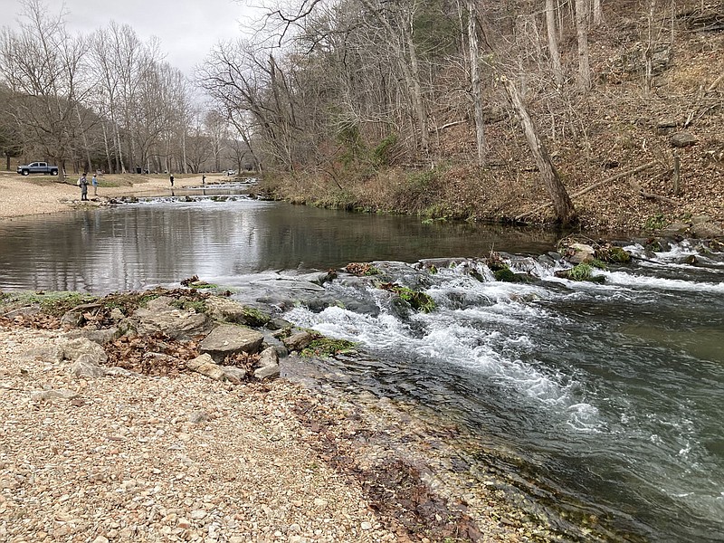 Anglers have plenty of room on Dec. 2 2022 while fishing for trout at Roaring River State Park near Cassville, Mo. The park offers catch and release trout fishing four days each week from mid November through mid February.
(NWA Democrat-Gazette/Flip Putthoff)