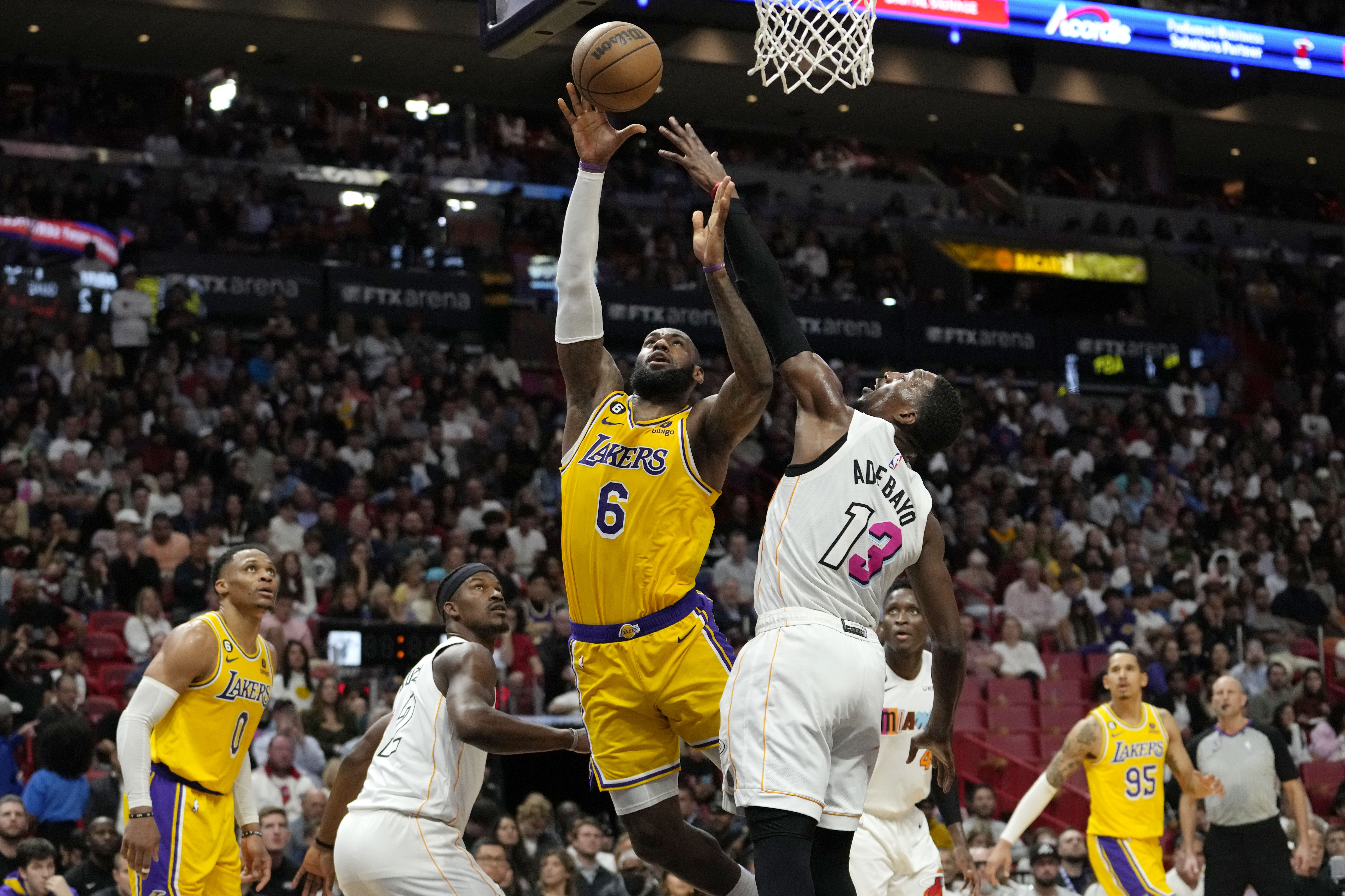 Lakers' LeBron James slam-dunks father time in his 21st NBA season