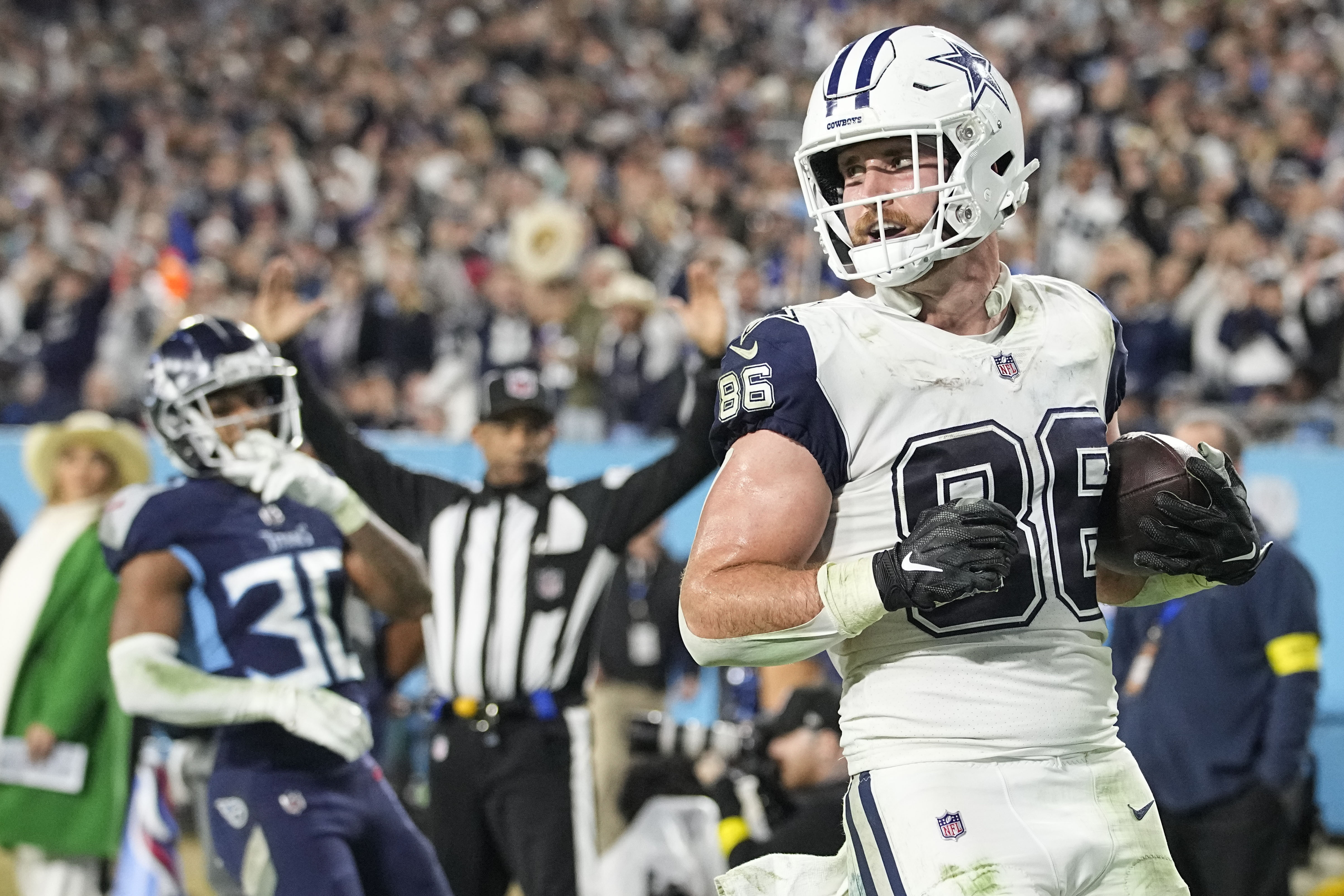 Dallas Cowboys' Michael Gallup (13) celebrates his touchdown catch in the  second half of an NFL