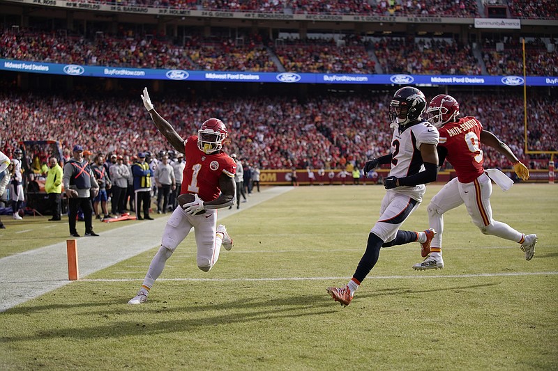 Kansas City Chiefs wide receiver Justin Watson (84) celebrates his  touchdown catch with teammate Jerick McKinnon (