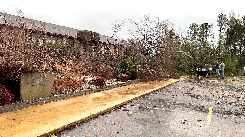 Damage to the Jessieville School District Administration Building and a vehicle as the result of severe weather are shown Monday afternoon. - Photo by James Leigh of The Sentinel-Record