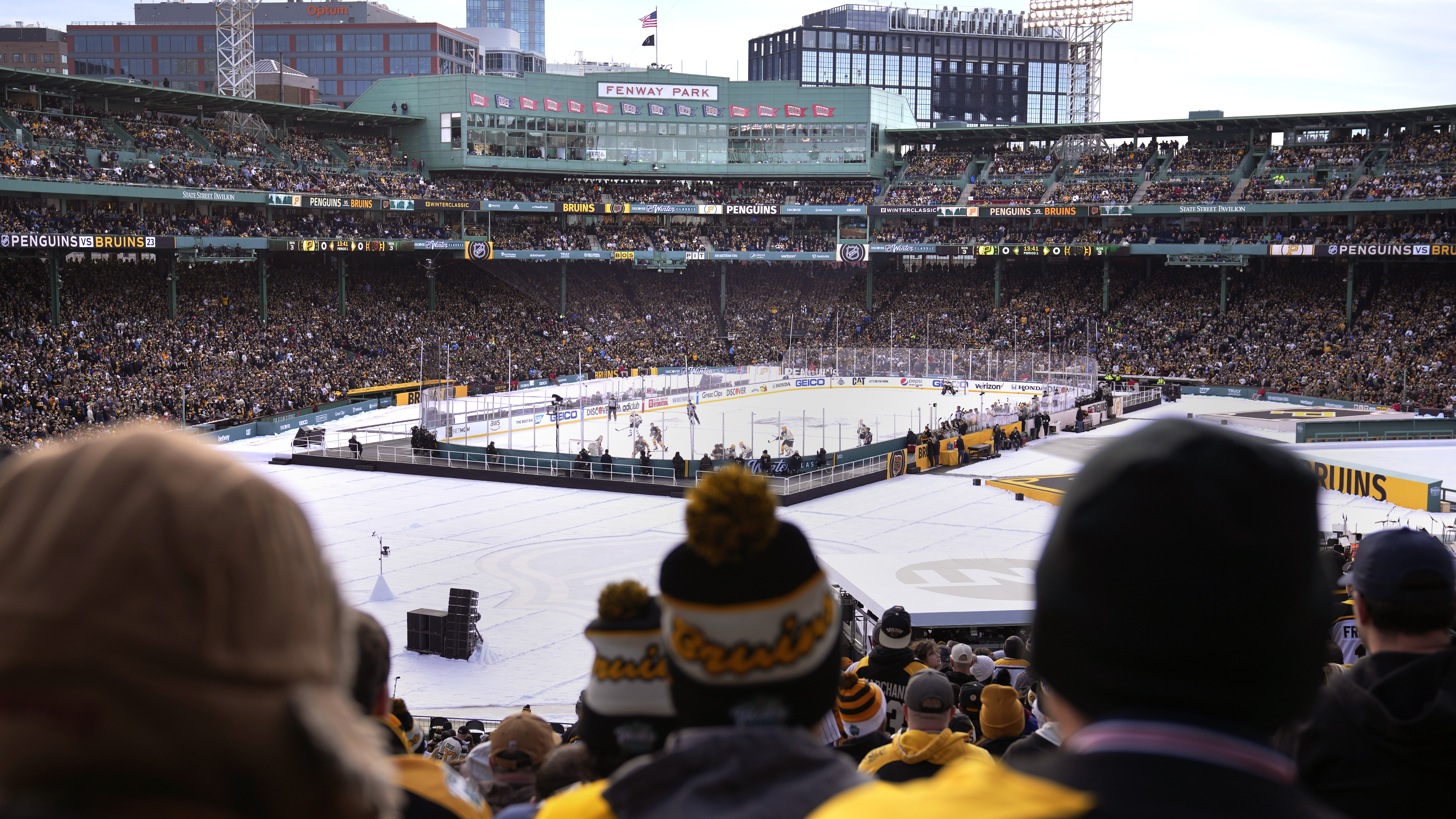 Bruins and Penguins team photos on the 2023 Winter Classic stage