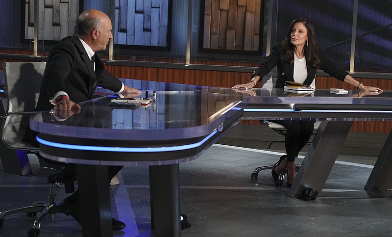 Kevin O’Leary (left) and Bethenny Frankel, co-hosts of the the financial show “Money Court” are shown on the set in Miami. (Jeff Daly/CNBC via AP)