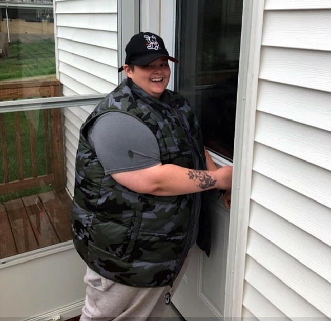 Submitted photo: 
Carmella Breen opens the door to her home for the first time. Breen worked with CCYP to get into a three-bedroom home outside of Columbia.