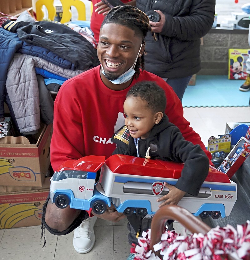 Surging sales of Damar Hamlin's football jersey going to his toy charity  for children 