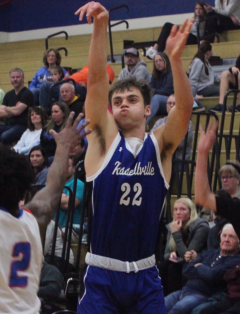 Russellville senior guard Charlie Miller knocks down a three pointer for the Indians. Miller had 17 points and six rebounds against California. (Democrat photo/Evan Holmes)