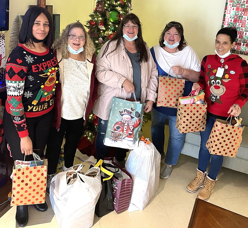 Senior group delivers Christmas gift bags to Hutchinson nursing home