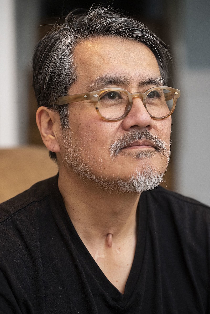 Glenn Tabata's scar from the tracheotomy needed to put him on a ventilator is a visible manifestation of his long-haul battle with COVID-19. (Monica Herndon/The Philadelphia Inquirer/TNS)