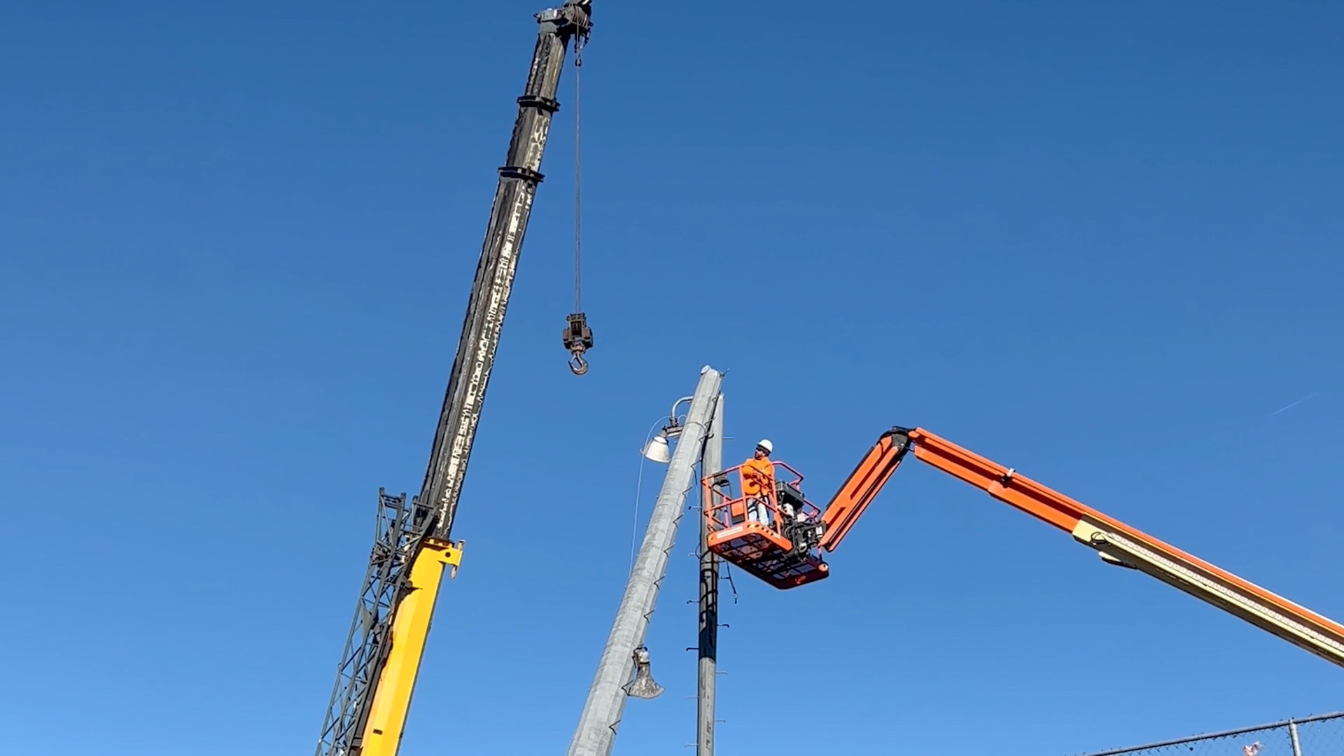 WATCH: Crews remove storm-damaged stadium lights - Vimarsana News