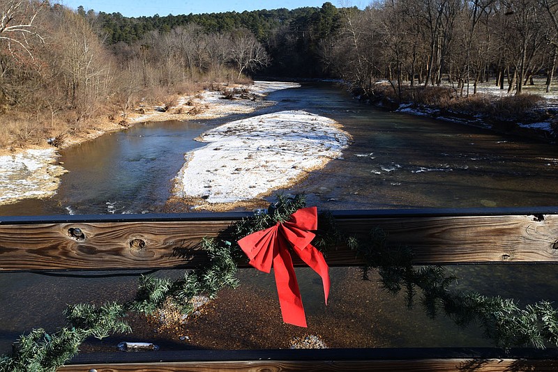 A snowy War Eagle River, seen on Christmas Day Dec. 25 2022, was a reminder of a canoe river trip long ago after 4 inches of snow.
(NWA Democrat-Gazette/Flip Putthoff)