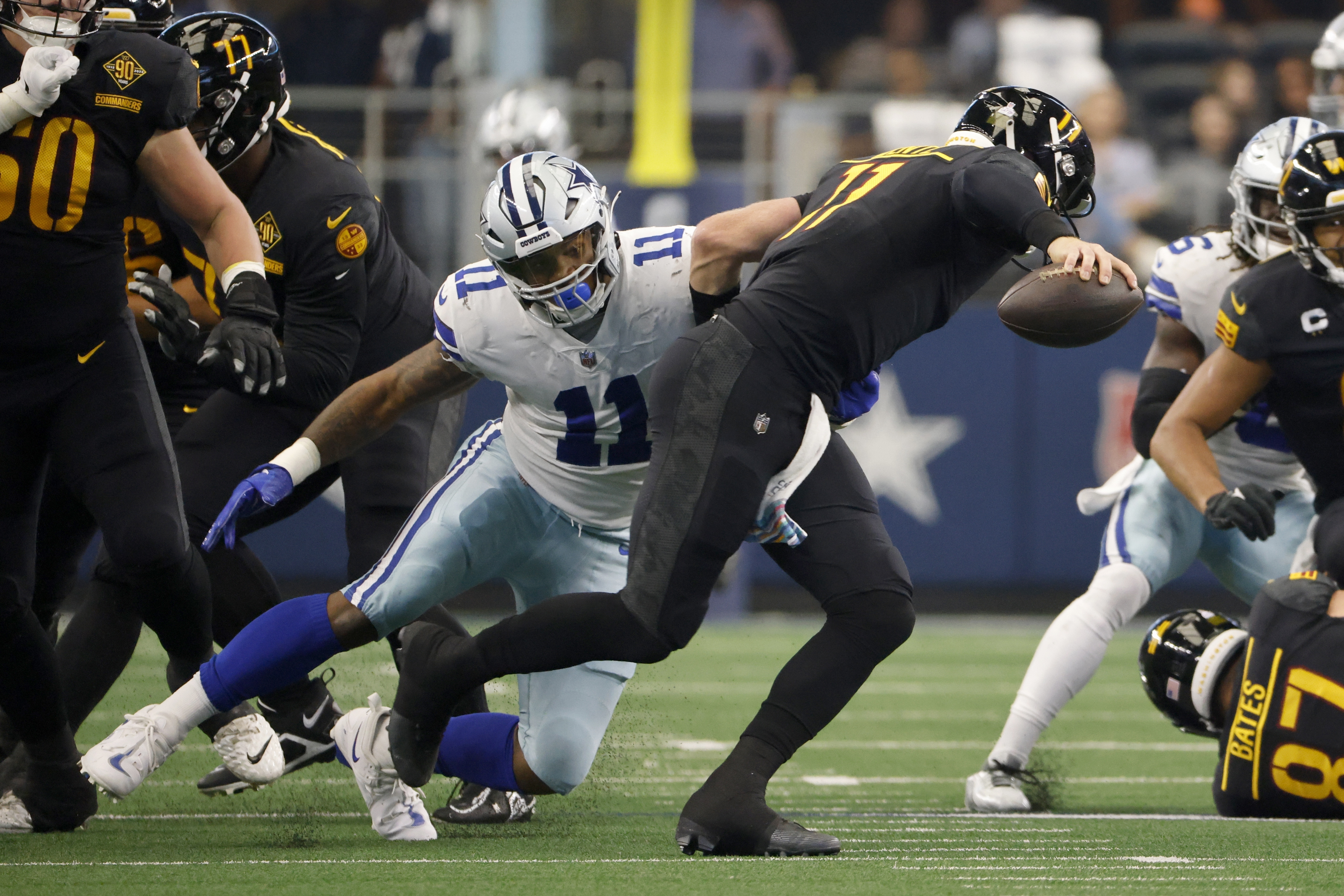 Dallas Cowboys linebacker Micah Parsons (11) watches from the