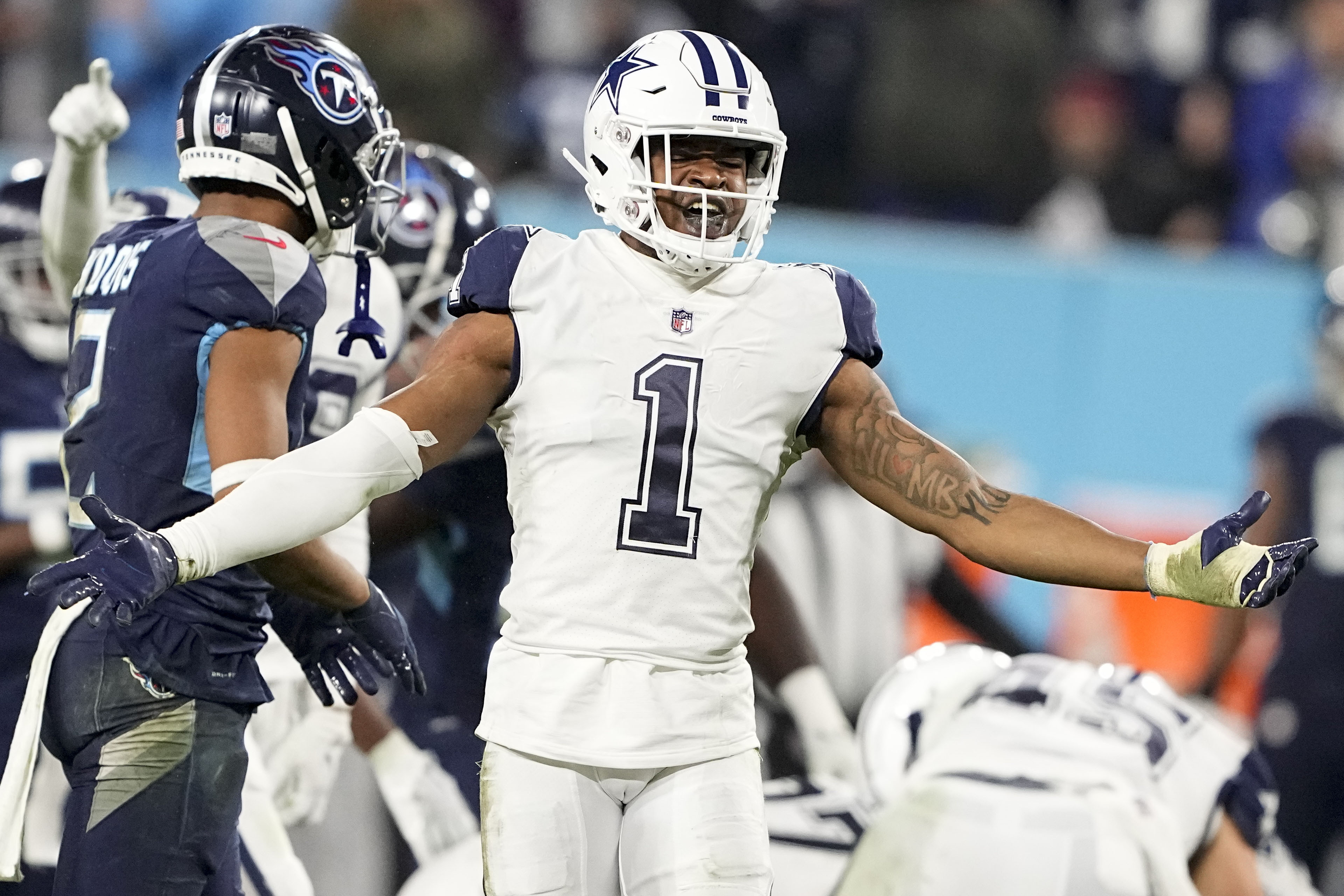 ARLINGTON, TX - AUGUST 26: Dallas Cowboys cornerback Nahshon Wright (25)  runs back for yardage after an interception during the game between the  Dallas Cowboys and the Seattle Seahawks on August 26