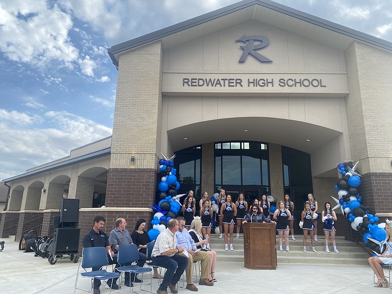 Redwater ISD Superintendent Dr. Kelly Burns speaks at the podium during a grand opening for a new addition to Redwater High School on Tuesday, Aug. 9, 2022, in Redwater, Texas. (Staff photo by Andrew Bell)
