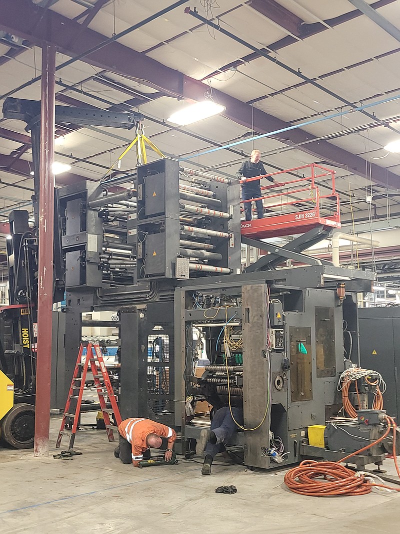 Photo courtesy Walsworth Fulton: 
Workers begin installing the Goss M600 printing press at Walsworth in Fulton. The new press is expected to be operational in February.