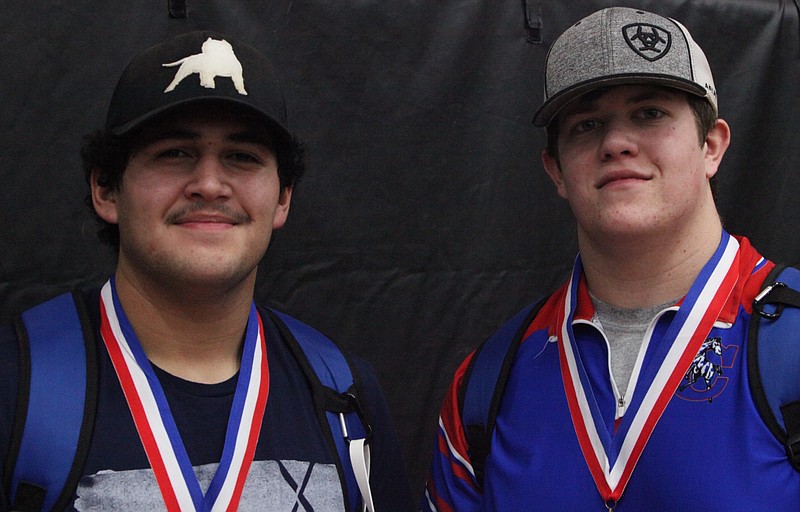 Junior Alexis Anguiano (left) and senior DJ Schneider (right) won third place medals at the Tri-County Conference Tournament on Saturday. (Democrat photo/Evan Holmes)